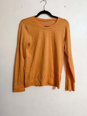 Lululemon Swiftly Relaxed Long Sleeve Size 6 Summer Glow Mango Dream hip waist